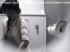 Spy security checking clothes in toilet
