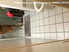 Husband secretly tapes his wife in shower