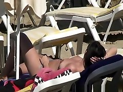 Topless women at beach
