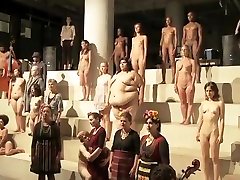Nude opera features a lovely girl with natural tits singing