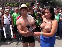 Latin dancer and TV host strip in public square