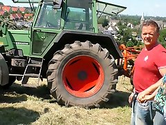 Bent over the tractor mature village slut gets nailed from behind
