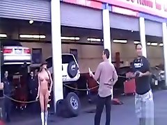 Naked goddess in boots gets attention in public