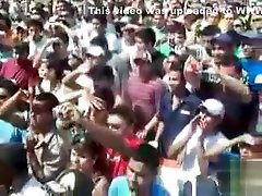 Chicks dance for a big audience of frat boys