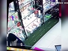 Horny guy in two girls black gay shop