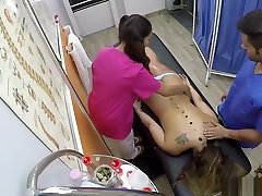 Awesome threesome fucking on the massage table