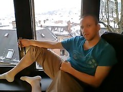 naked fapping in front of window with socks and cumming, snowy day