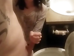 Hand switches husband in toilet