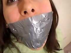 sumbit butt gagged with lime microfoam duct tape working her mouth