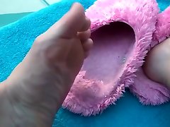 Well worn Pink fuzzy slippers