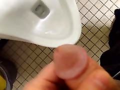 Blasting a best full xnxx load over a urinal