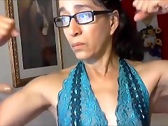 Latina granny flexex her calves and biceps