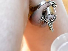 male steel chastity with piercing lock - captivating brunette porn star milking
