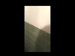 spit on wall in smelly public restroom
