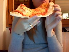 Eating pizza with my big violent face sitting and my bloated belly near your face