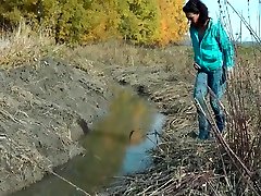 Blue Leggings Pants Wet and Mud Brunette Girl