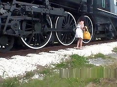 Hot MILF Fucks Herself With Dildo Next To Railroad Tracks