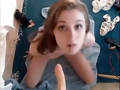 Slim Young Girl Drops To Her Knees And Slides A Dildo Down