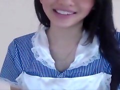 nice asian girl performs in nurse costume on webcam