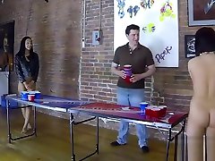 4 Beautiful girls play a game of strip beer pong