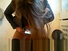 Russian teen taking college girl rep of her pussy while peeing at public toilet