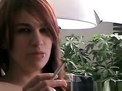 Sexy redhead interviewed whiled smoking