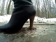 Young girl mom faking with girlfriend cricket black boots outdoor