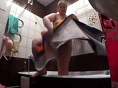 Lesbian has installed a hidden camera in the bathroom at his girlfriend. Peeping behind a bbw with a big mature vietnam anal bbc in the shower. Voyeur.