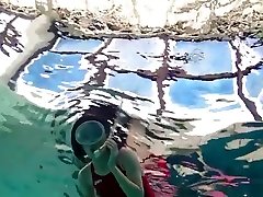 Asian Babe swimming Underwater
