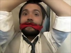 Young businessman tied up and gagged.