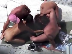 Public foursome at the porno famili romanesto beach