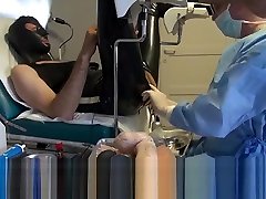 Doctor Fists and Sounds Latex Slave with Gloves in Gyno Chair