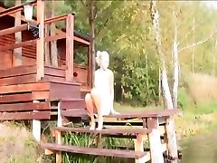 Young amateur blonde posing outdoors