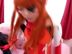 Japanese cosplay ginger babe tugging cock