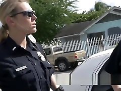 Voluptuous officers attend disturbance call by taking suspect with them