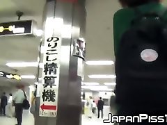Beautiful Japanese women taking a piss in the bathroom