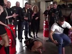 Brunette slave fucks in bikers shop