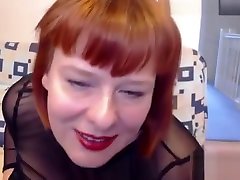Spectacular redhead BBW milf shows her huge boobs on cam