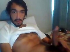 sexy bearded hairy mexican guy jerking his curved hairy cock