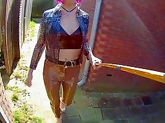 cd cher in creaking shiny pvc in the alley