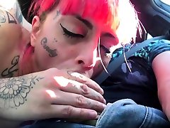 Tattooed babe Candy Doll fucks outdoor