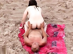 Horny matures caught at the nude beach Horny matures caught at the nude beach