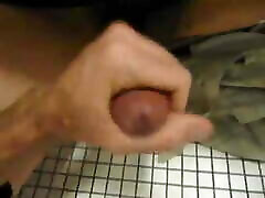 JACKED UNDER THE STALL BLOWS NICE CUM.