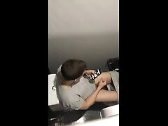 guy play in toilet and watching xxx