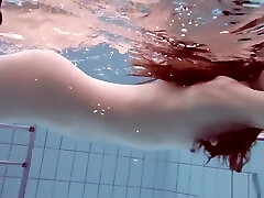 Cheh sexy redhead naked swimming