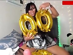 Sexy Asian in french maid outfit vibrating her pussy and blowing dildo