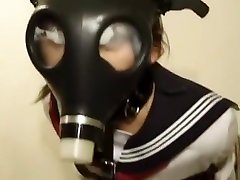 Japanese schoolgirl gas mask bondage