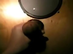 My whore hidden cam kand slurps on a strangers cock and jerks him off at a gloryhole