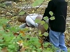 Very attractive blonde sucking dick and getting fucked doggystyle in the woods while being secretly videotaped