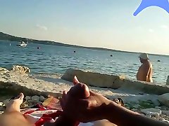 On a nude beach the wife stokes my cock while a step son licked mom pussy watches